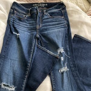 American Eagle stretch wide leg/boot cut jeans, distressed with pocket detail